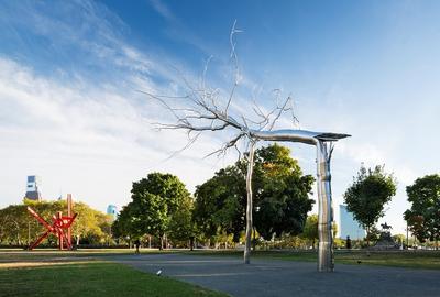 "Symbiosis" (2011, installed 2014) by Roxy Paine acquired by the Association for Public Art with the support of the Daniel W.  Dietrich II Trust, Inc.  Background: "Iroquois" (1983-1999, installed 2007) by Mark di Suvero, acquired by the Association for Public Art with the support of David.  N.  Pincus.  Photograph by James Ewing Photography © 2014, courtesy Association for Public Art.