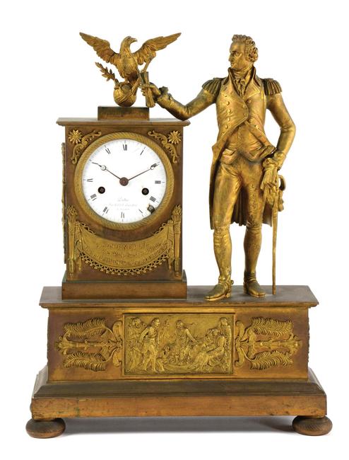 Extremely rare circa-1810 neoclassical brass and ormolu mounted mantel clock, Dubuc (Paris) for American market, depicts George Washington with American eagle.  Signed on enameled dial.  Estimate $40,000-$80,000