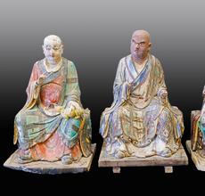 Set of Three Chinese Polychrome Stucco Lohans, Song/Yuan Dynasty Height of each: 24 inches(61cm) 