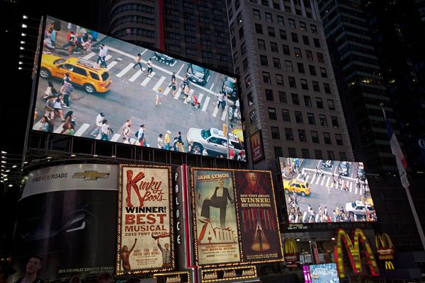 Ryan McGinley, Varúð (2012); shown in Times Square.  Photo by Ka-Man Tse for Times Square Arts.  