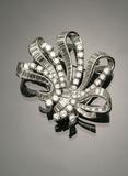 Pair of Platinum and Diamond Bow-Knot Clips, Mounted as Brooch