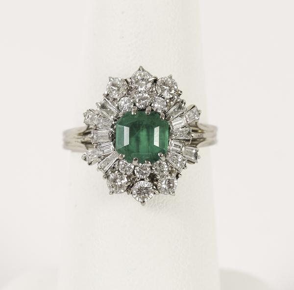 An Emerald and Diamond 18K White Gold Ring (Estimate: $1,600-1,800)