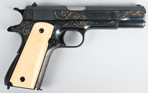 Gold-inlaid Colt 1911 .45 ACP-caliber gun, factory-engraved by Colt master engraver William H.  Gough (active 1912-1940).  Shipped in 1931 to Scruggs, Vendervoort & Barney, St.  Louis.  Sold for $51,600 against an estimate of $25,000-$35,000