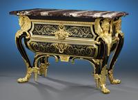 Henry Dasson based this commode upon the famous pair Boulle created for Louis XIV.  