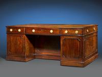 This incredibly rare pedestal desk bears numerous characteristics that suggest its creation by Thomas Chippendale himself.