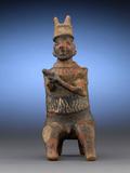 This incredible Nayarit Warrior Figure represents a highly respected chieftain, as indicated by the horns, staff and seated posture.  