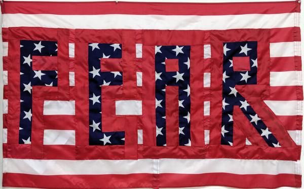 Sara Peak Convery “Divided States of America (The FEAR Flag)”, (2019) Printed U S Flags, thread, 34 x 53 inches.  Courtesy the artist.