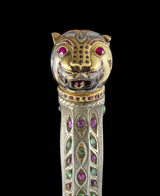 A rare gem-set sword with tiger’s head pommel from Tipu Sultan’s royal regalia.  Estimated at £60,000-80,000 it was sold for £2,154,500