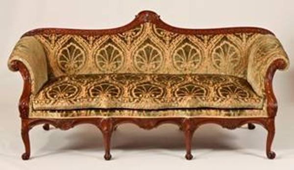 The 1st Earl Spencer’s Carved Fustic and Satinwood Sofa, c.  1758-65.  Height: 40½ in (103 cm).  Depth: 36 in (91 cm).  Length: 86 in (219 cm).  Price: $850,000 (£550,000).  Fustic is a hard and dense wood from a tropical American tree.