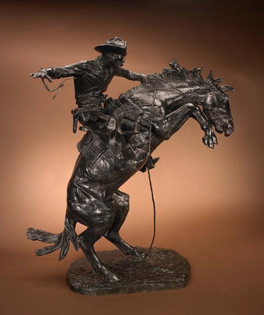 Frederic Remington (1861-1909) Bronco Buster #16, Bronze, 33.25 inches.