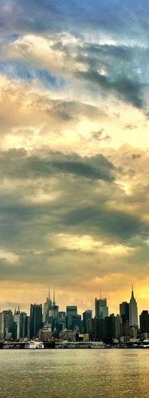 The New York City skyline after a stormy afternoon from Port Imperial, NY Waterway in Weehawken New Jersey.