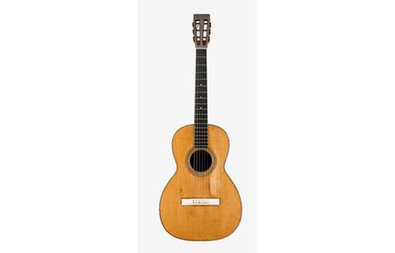 C.  F.  Martin Guitar, Style 0-40, c.1880, used in performances and recordings by Joan Baez 1966-68.  Sold for $12,500.