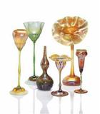 TIFFANY STUDIOS, A Selection of Decorated and Floriform Favrile Glass Vases, circa 1900-1910.  Estimates from $5,000 to $20,000.