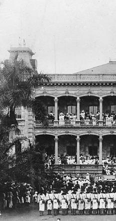 Raising American Flag at United States Annexation Ceremony at ʻIolani Palace, Honolulu, Hawaii.  The American marines performing the ceremony are from the USS Philadelphia.  Collection: Ray Jerome Baker Collection.  1898.