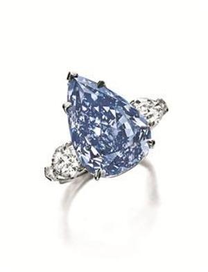 THE WINSTON BLUE A pear-shaped Fancy Vivid Blue Flawless Diamond of 13.22 carats sold for $23,795,372 at Christie's.