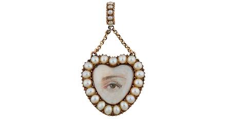 Lover's Eye 19th century heart pendant, gold, seed pearls, glass, miniature painting of a hazel eye, braided human hair, 15/16"w x 1 3/4"h overall.  Estimated Value: $800 - $1,200.  Sold for $2,600