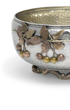  American sterling silver and mixed-metal Japanese style punch bowl and ladle, 1881, by Gorham Mfg.  Co., Providence, RI, h.  6 1/4in (15.75cm);x d.  12in (30.5cm); ladle length 11in (28cm).  