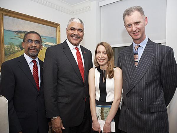 Jennifer Krieger standing with His Excellency the Governor of Bermuda, The Hon.  George Fergusson; Premier, The Hon.  Craig Cannonier, JP MP; and Gary L.  Phillips OBE JP