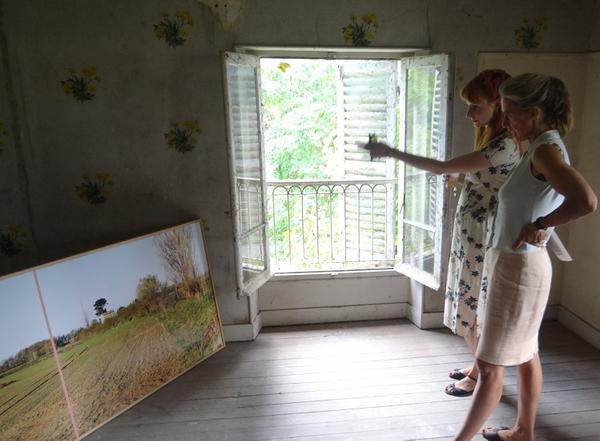 Predoctoral fellow Kathleen Reinhardt (left), of the Freie Universität Berlin, and an advisor review artwork at the 2012 Terra Summer Residency, in Giverny, France.  Photo: Mads Vonli.