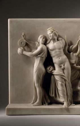 ITALIAN SCHOOL, 19TH CENTURY.  Apollo and the Graces.  White Marble 18 1/2 x 31 1/4 x 6 in.  (47 x 79.5 x 15 cm.)