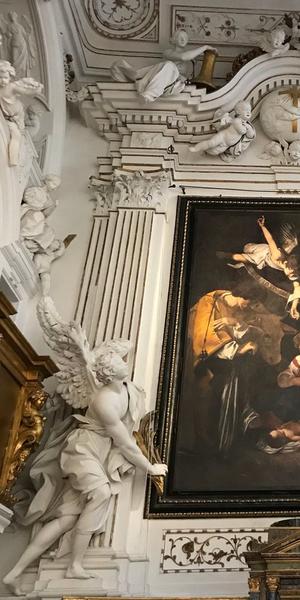 A copy of "Nativity with San Lorenzo and San Francesco" by Caravaggio hangs where the original was stolen from a church in Sicily.