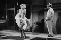 Marilyn Monroe wearing the iconic dress with its skirt billowing over a subway grate in the 1954 film The Seven Year Itch.