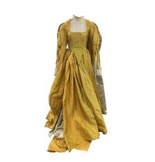 Signature evil queen dress worn by Julia Roberts in the movie Mirror Mirror Evil Queen, designed by the late Oscar-winning costume designer Eiko Ishioka (est.  $10,000-$15,000).