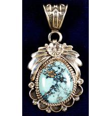 Gorgeous 18-karat lavender blue and turquoise stone set in a sterling silver pendant (est.  $1,000-$1,800).