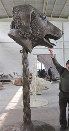 Provocative Chinese artist Ai Weiwei, shown with the Dog sculpture (left), has selected the National Museum of Wildlife Art in Jackson Hole for his Circle of Animals/Zodiac Heads exhibition of 12 monumental bronzes, which also includes The Dragon (right).  