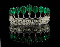 An emerald-and-diamond tiara brought a record price of $12.7 million.