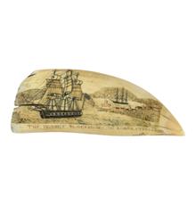 Scrimshaw whale's tooth by the Naval Monument Engraver sold for $396,00 at Eldred's Marine Sale.