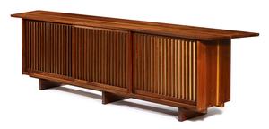 Lot 16: $40,625.  George Nakashima (1905-1990), special triple sliding door cabinet, 1959.  