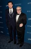 Gala Co-Chair Leonardo DiCaprio (L) and honoree Martin Scorsese, wearing Gucci, attend the LACMA 2013 Art + Film Gala honoring Martin Scorsese and David Hockney presented by Gucci at LACMA on November 2, 2013 in Los Angeles, California.  