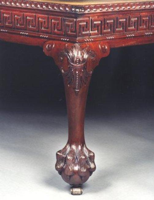 Highly important mid 18c.  POWDERHAM CASTLE LIBRARY TABLE by Otho Channon.  Carved Mahogany gadrooned edge and Greek key pattern, 2 drawers at RONALD PHILLIPS.  28.25x88.24x 51.25.  