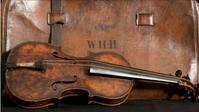 Wallace Hartley's violin played on the Titanic will be sold at auction.