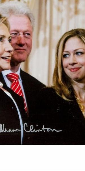 Hillary Clinton - Lot #1661 signed photo of her being sworn in as Secretary of State and an autographed baseball