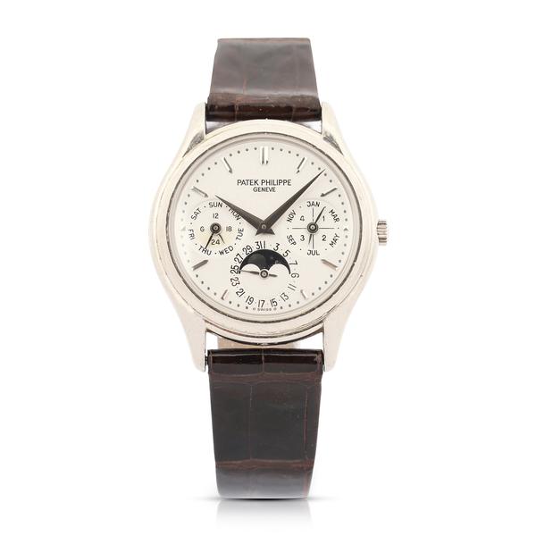 Patek Philippe Reference 3940 perpetual calendar men’s watch with 18kt white gold case and clasp, originally purchased in 1999 from Tourneau in New York (CA$50,150).