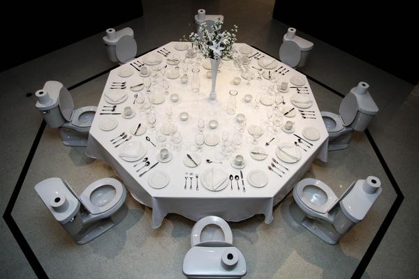 Paul Ruscha (U.S.  b.  1942) Dinner for Donald, 2020; Table, toilet, and place settings; 156” diameter; Loan courtesy of the artist.