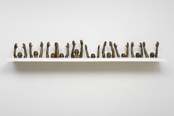 Hank Willis Thomas, Raise Up , 2014 Bronze 112.2 x 9.84 inches.  © Hank Willis Thomas, courtesy of the artist and Jack Shainman Gallery, New York.