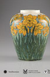 Vase, 1897.  Daffodil design.  Underglaze painting with glossy glaze.  Unknown decorator; Joseph Meyer, potter.  On loan to the Newcomb Art Gallery from Ruth Weinstein Lebovitz