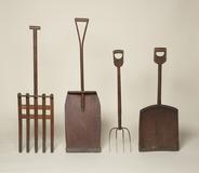 Shaving shovel, wood, metal, 52 ⅜" x 14 ⅝" x 3 ⅓", 1950.3485.  Snow Shovel, pine, maple, iron, 56 ½" x 15 ⅜" x 5 ⅛" 1950.3355.1 Spading Fork, wood, metal, 42 ¾" x 8 ⅞" x 3 ⅜", 1950.3201.1 Shovel, Oak, iron, 42 ⅜" x 16 ⅝" x 1 ⅞", 1952.4656.1 Collection of the Shaker Museum| Mount Lebanon, New Lebanon, New York Photo by Alan LaValle 