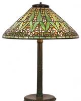 This Tiffany Studios Arrowroot table lamp with 20-inch diameter conical form shade, 26 inches tall, will come up for bid June 21st.