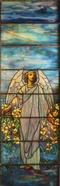 This turn-of-the-century Tiffany Studios memorial stained glass window sold for $71,300 at Cottone Auctions.