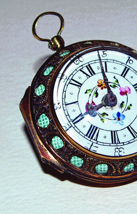 18th century enamel snuff box in the form of a watch.