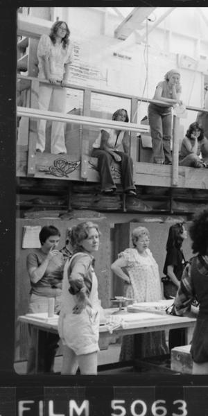 Judy Chicago addresses a gathering of volunteers in the Dinner Party studio, ca.  1978, studio.