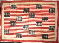 Parade flags trundle quilt, early 20th century.