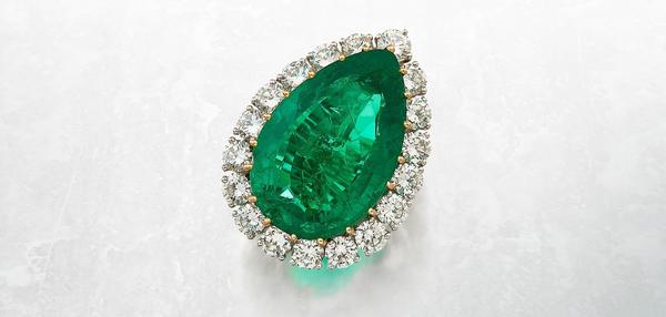 Lot 50: The Wakil Emerald Platinum, gold, emerald and diamond ring, Van Cleef & Arpels, circa 1974.  