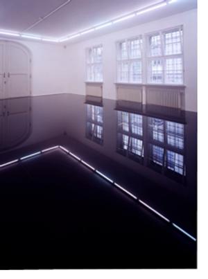 Image: Haraguchi Noriyuki, installation view of Untitled at Städtische Galerie im Lenbachhaus, Munich, 2001.  Steel, used motor oil, 7 1/8 x 133 7/8 x 275 5/8 inches (18 x 340 x 700 cm)