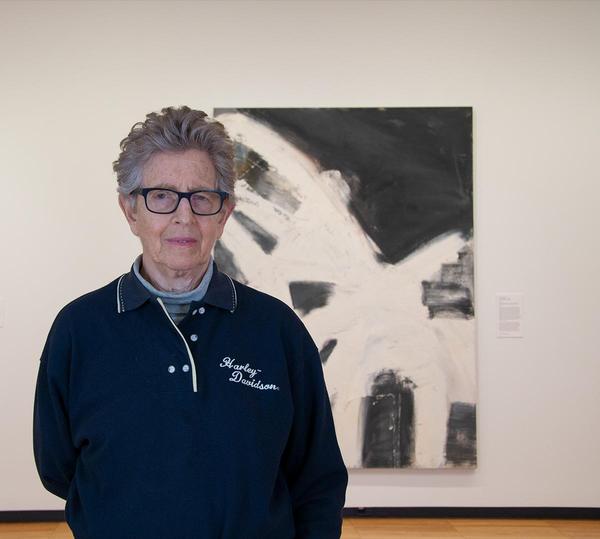 Louise Fishman with her 1996 oil painting "Blonde Ambition" at Krannert Art Museum, University of Illinois Urbana-Champaign, 2019.  Photo by Julia Nucci Kelly