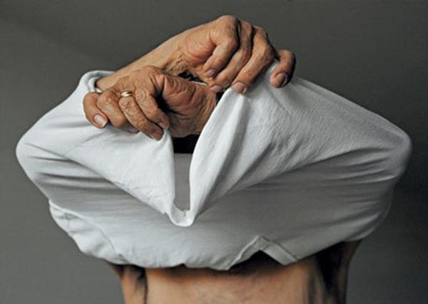 Judith Fox, Undressing.  C-Print, 2006 15 x 21 inches 